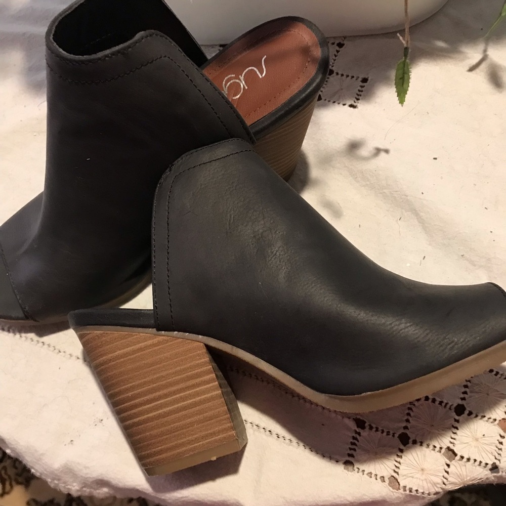 3” black slip on chunky heal. Never worn.